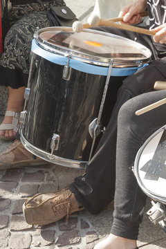 Hands of Drummers Playing on the Street