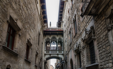 Lace balcony between two houses in Barcelona city center, Spain