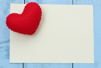 Red heart placed on paper note of empty for input text or messag