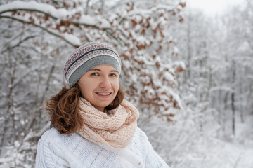 Attractive young woman in wintertime outdoor