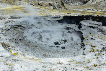 volcanic mud hole on white island, new zealand