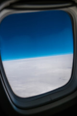 Fototapeta premium The beautiful view of the cloud from the airplane porthole
