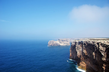 Fototapeta na wymiar Seascape with fog of Cabo de S. Vicente, Algarve, Portugal