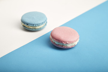 french colorful macarons on colorful background