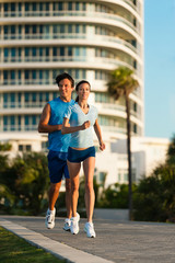 Young Couple Man and Woman Running Morning