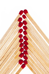 composition of matches with rad heads isolated on white background