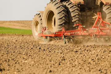 Close up shot of seedbed cultivator machine at work © oticki