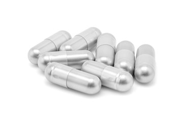 silver pill capsule isolated on white background