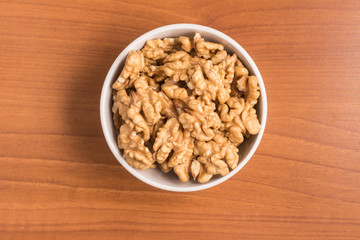 Walnuts into a bowl