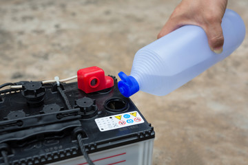 car battery maintenace with distilled water