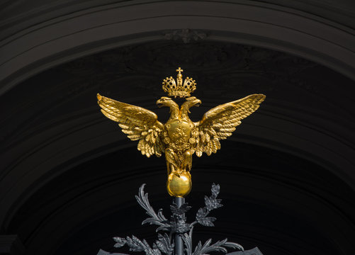 Golden two-headed eagle on the gates of the State Hermitage Muse