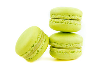 stacked green cake macaron isolated on white background, maccarone sweet dessert