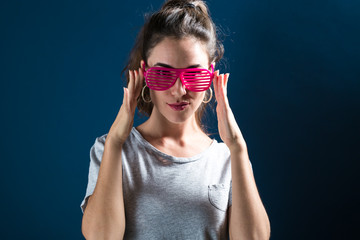 Young woman wearing shutter shades sunglasses