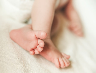 Obraz na płótnie Canvas The Small Cute Soles of Newborn Baby Feets.