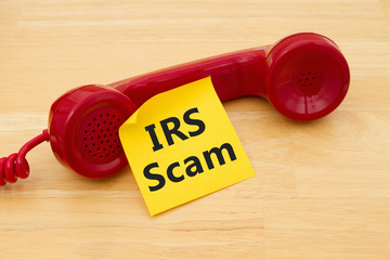 Getting a call that is an IRS Scam - obrazy, fototapety, plakaty
