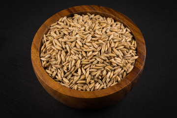 natural oat grains background, closeup