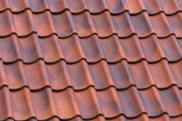 Red tiles roof background