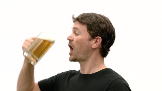 Model released man pours pint of beer on face because he simply loves beer that much.