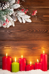 Christmas background with candles and fir tree