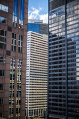 Fototapeta na wymiar Skyscrapers in downtown Chicago with reflections in windows