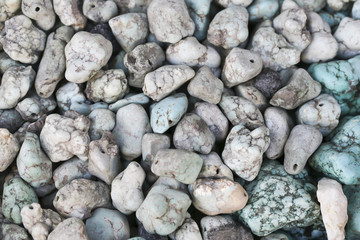 Closeup of various colorful stones quartz, marbles, ore minerals, gems use as ornament and decoration jewelry that contain spiritual force human believes