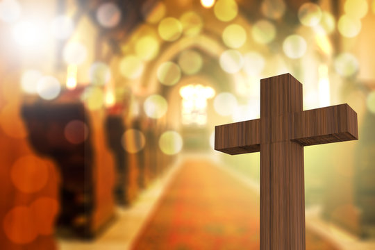3D rendering of wooden cross in blurred church interior