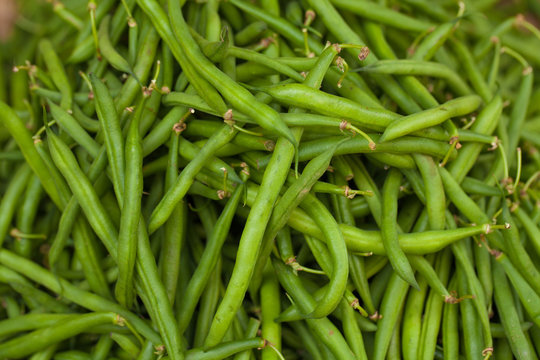 Lot of green bean put in weave basket local style sell in fresh market, Vietnam
