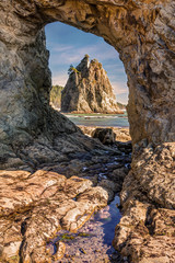 Hole in the wall, is an arch that you can reach at low tide at the end of Rialto Beach in Olympic National Park