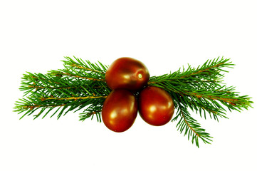creative green Christmas tree decorated with fresh red tomato on a white background