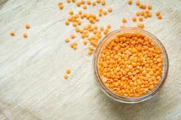 Red lentils in glasses jar