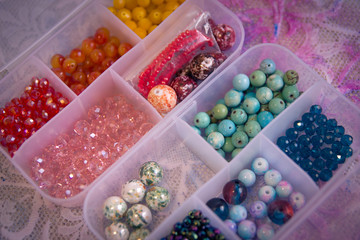 colorful beads in containers