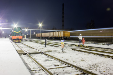 The train arrives on the railway station.