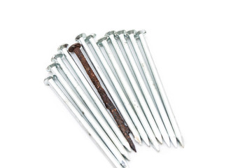 Old rusty nail and new ones