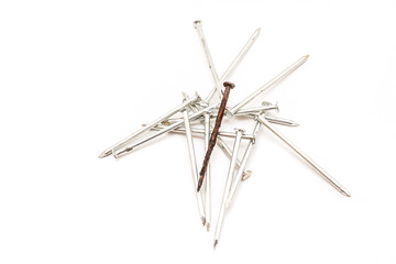 Old rusty nail and new ones