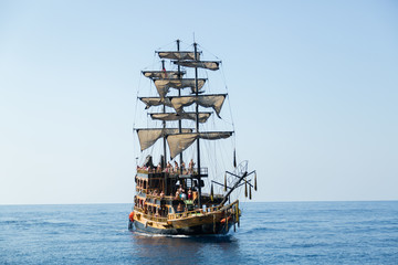 pirate ship with tourists on the sea