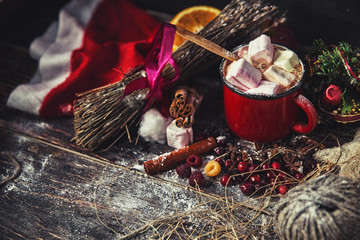 Red mug with hot chocolate with melted marshmallow