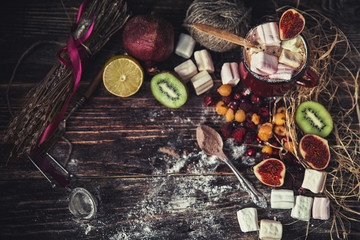 Red mug with hot chocolate with melted marshmallow