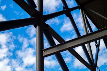 Iron architectural constructions with blue sky on background