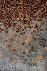 Coffee beans on grunge background texture