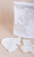 Baby goods. Kids' things. Children's clothing diapers pajamas mittens socks vests sliders