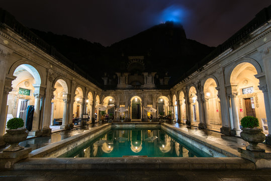Colonial Italian architecture Lage palace at night with the Corcovado mountain behind