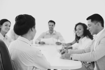 Business trainer giving presentation to group of people. Retro style