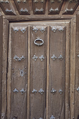 Wooden window with iron knocker