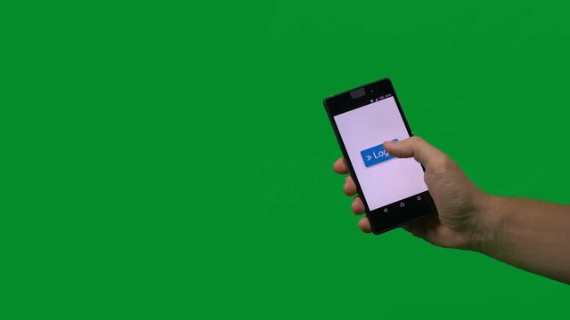 Male hand holding a black smartphone and hitting the Login button on the screen, very easy to key out (keylight) the greenscreen color and replace with your own video or website screenshot.
