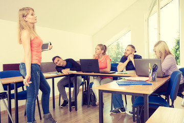 Fototapeta premium Students and teacher tutor in classroom