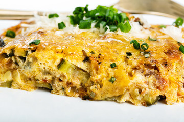 Vegetables casserole with cheese and chives