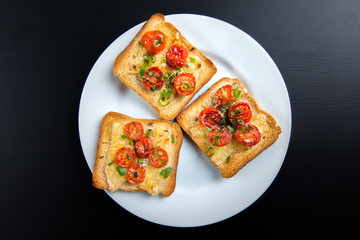 Grilled toast with camembert and cherry tomatoes