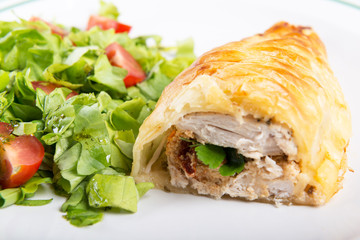 Chicken breast in french pastry with fresh salad