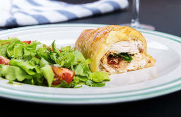 Chicken breast in french pastry with fresh salad