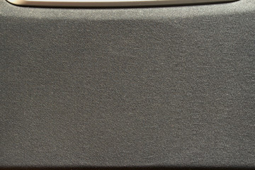 Black textile covering an audio speaker, speaker cloth or cover, material texture